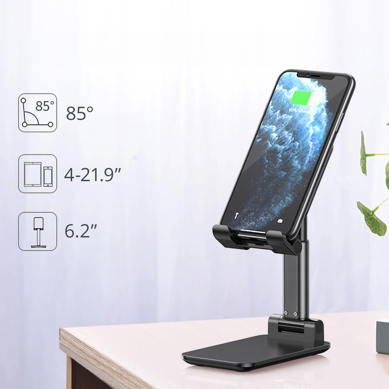 Choetech H88-BK stand standing on a desk with a smartphone and infographics showing the range of operation of the stand