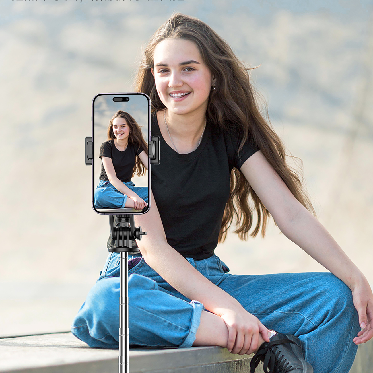 Woman taking a selfie using a WC1Y3S tripod