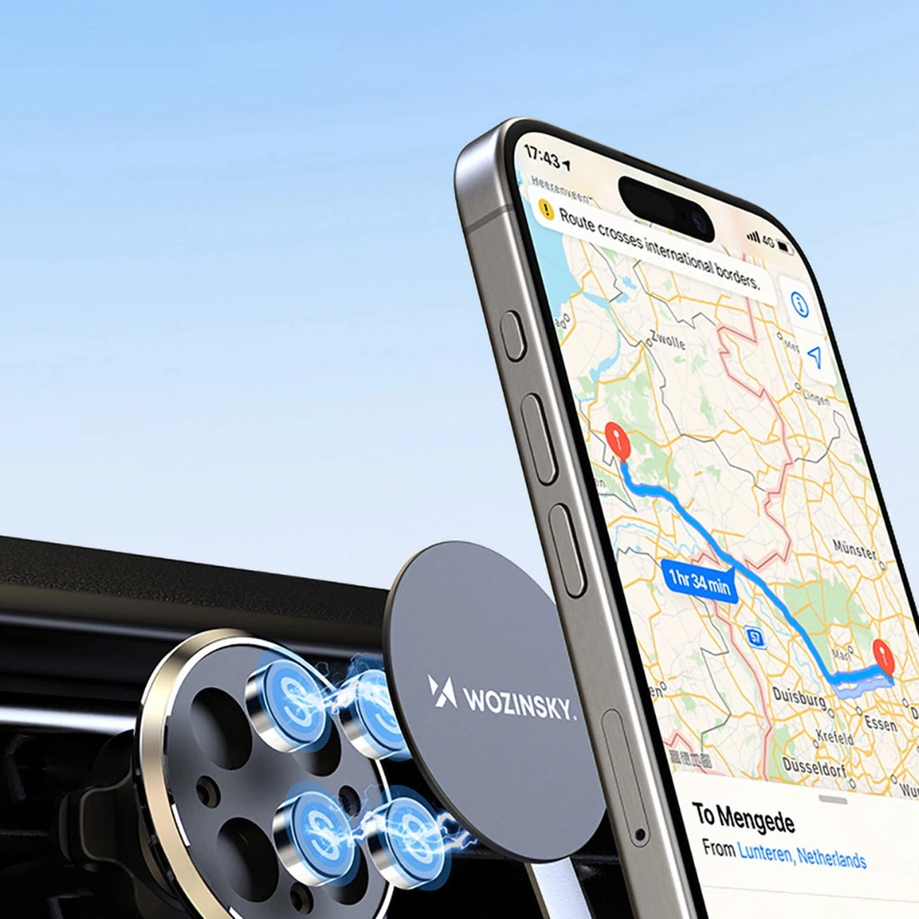 iPhone przyciągany do magnetycznego uchwytu samochodowego Wozinsky WUMKO zamontowanego do kratki wentylacyjnej samochodu za pomocą silnych magnesów