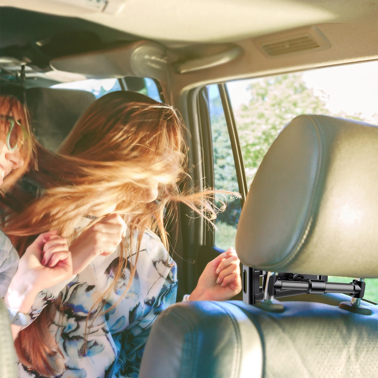 Baseus Backseat Car Mount holder attached to the headrest holds the device stably