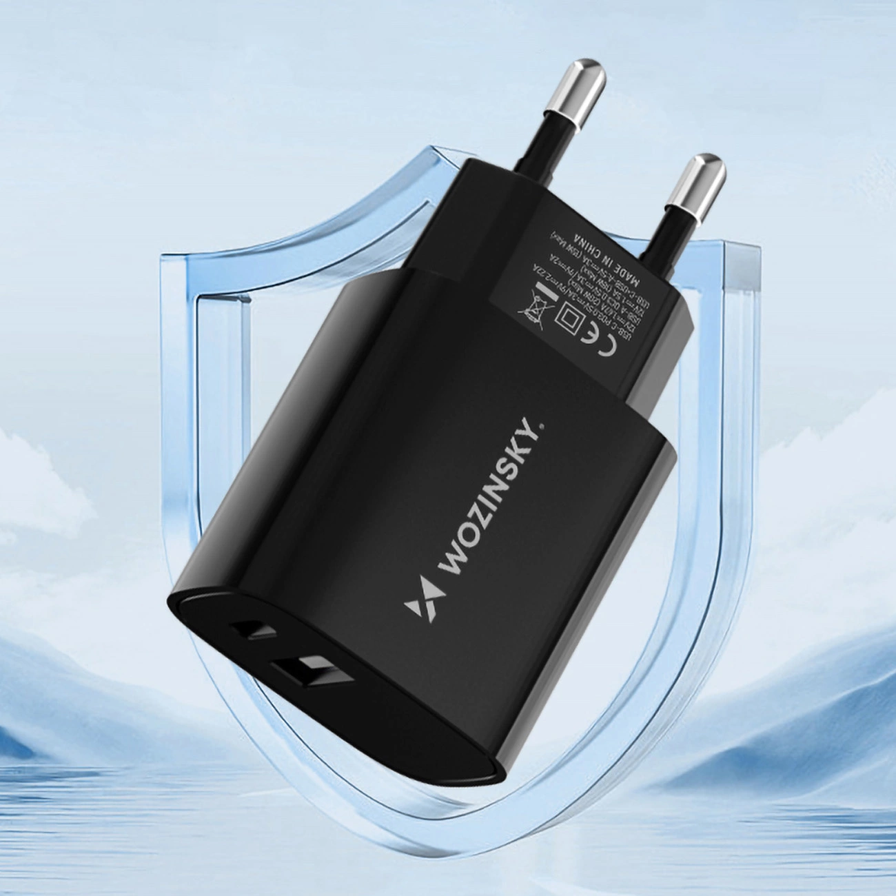 Wozinsky WGWCB wall charger with USB-A and USB-C connectors with a power of up to 20W against the background of mountains