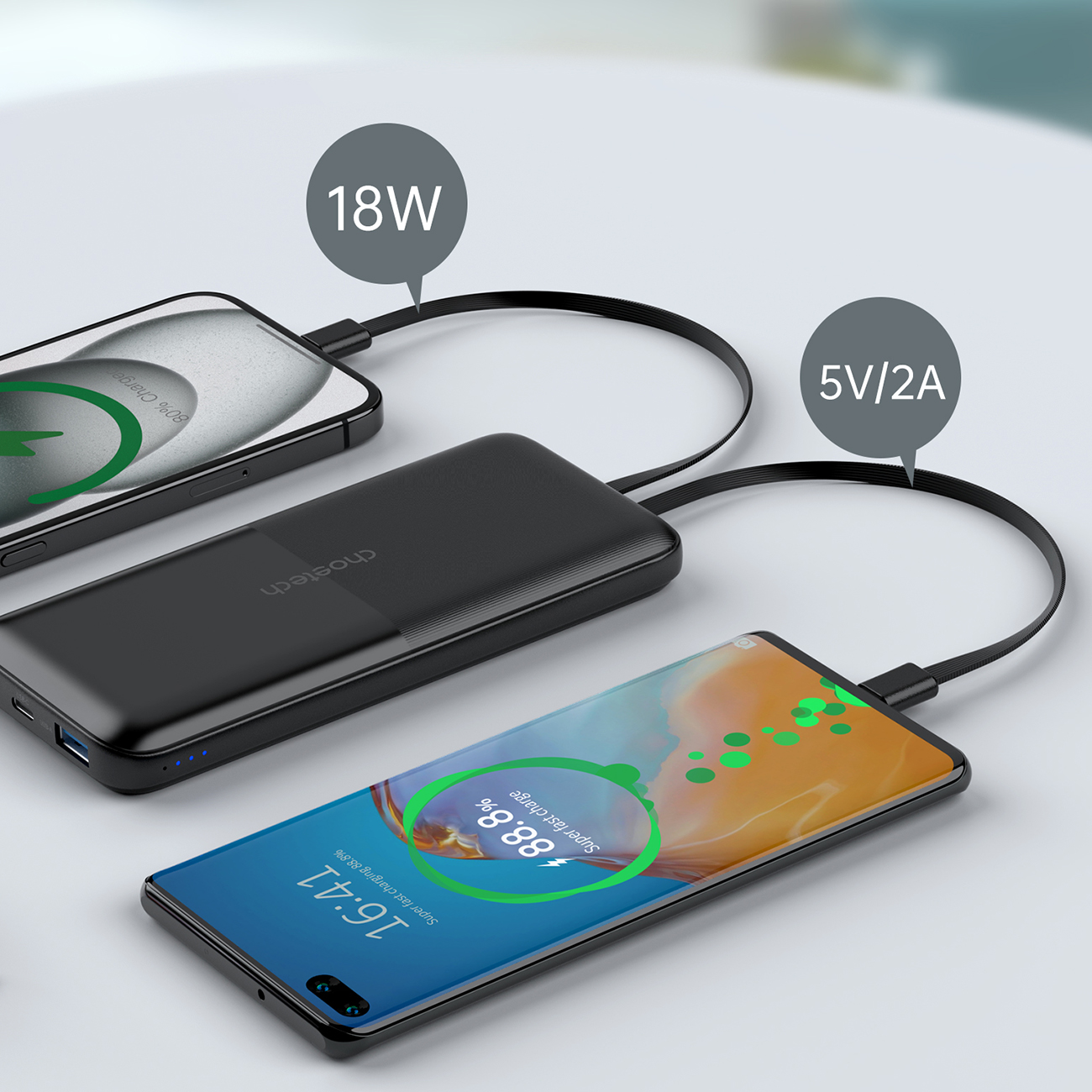 Two phones charged with the Choetech B654 power bank