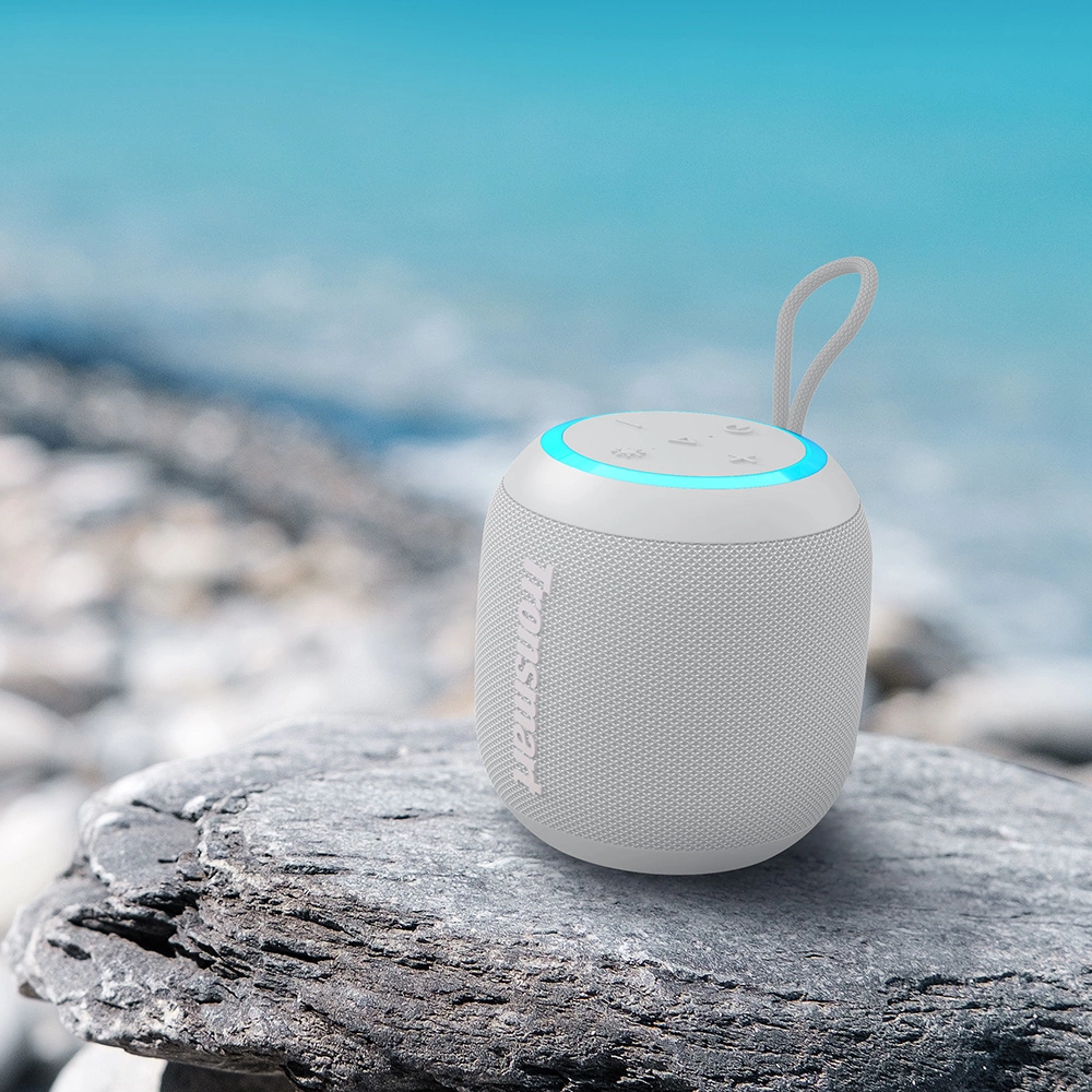 Tronsmart T7 Mini speaker against the sea background