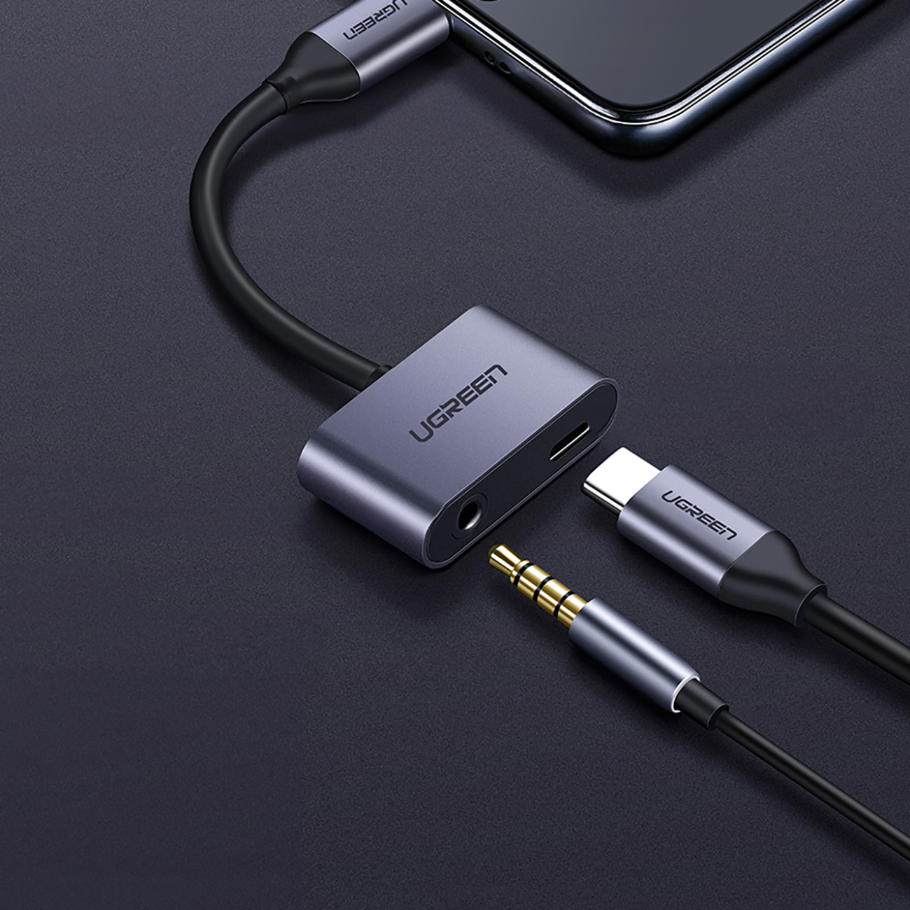 Audio and USB-C cables connected to the Ugreen CM193 50596 audio adapter