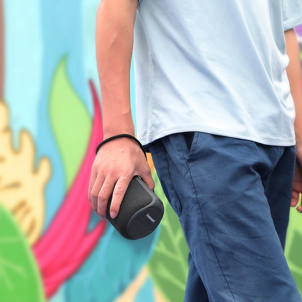 Man holding Tronsmart Element T6 Mini speaker