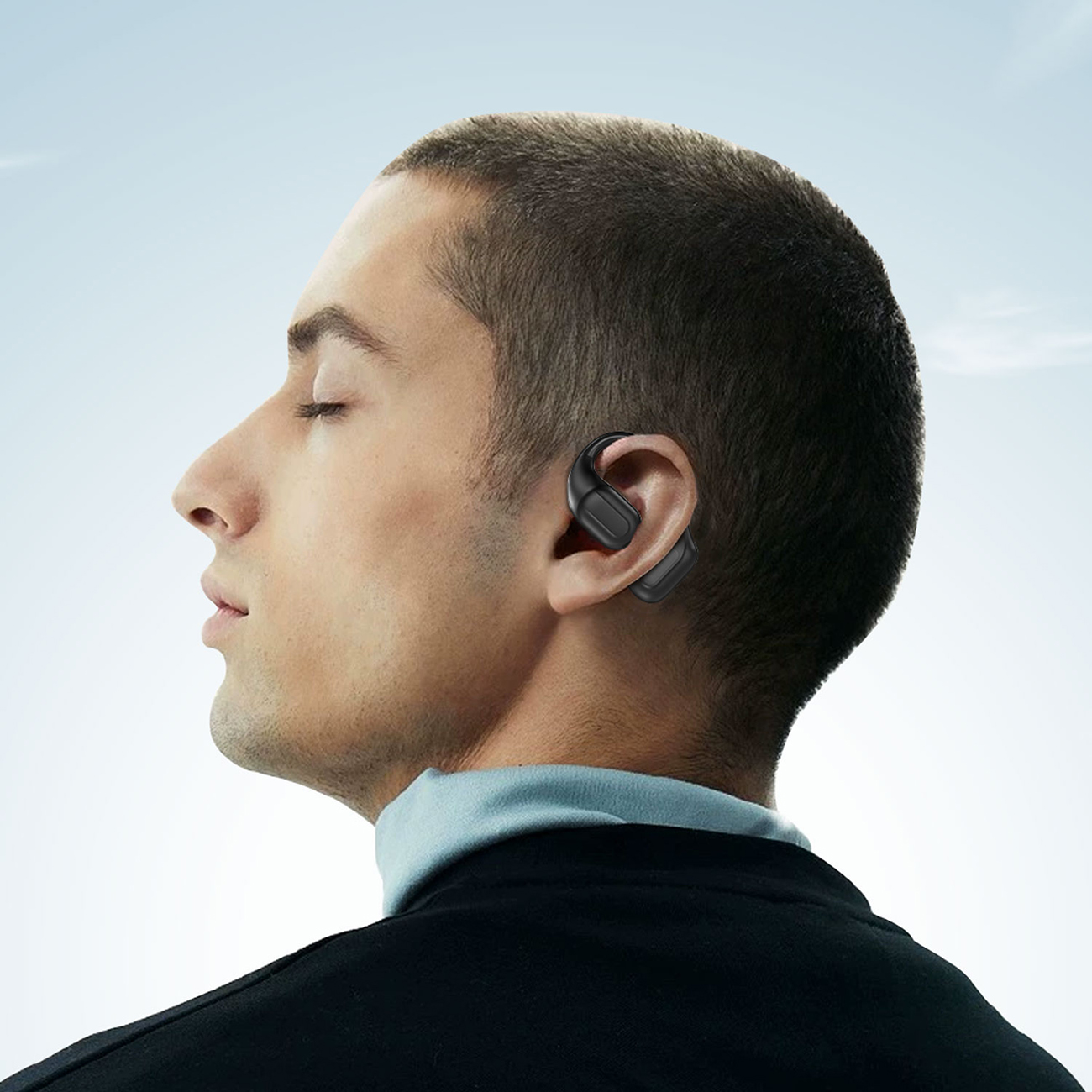 A man listening to music with Dudao U17Pro on-ear wireless headphones