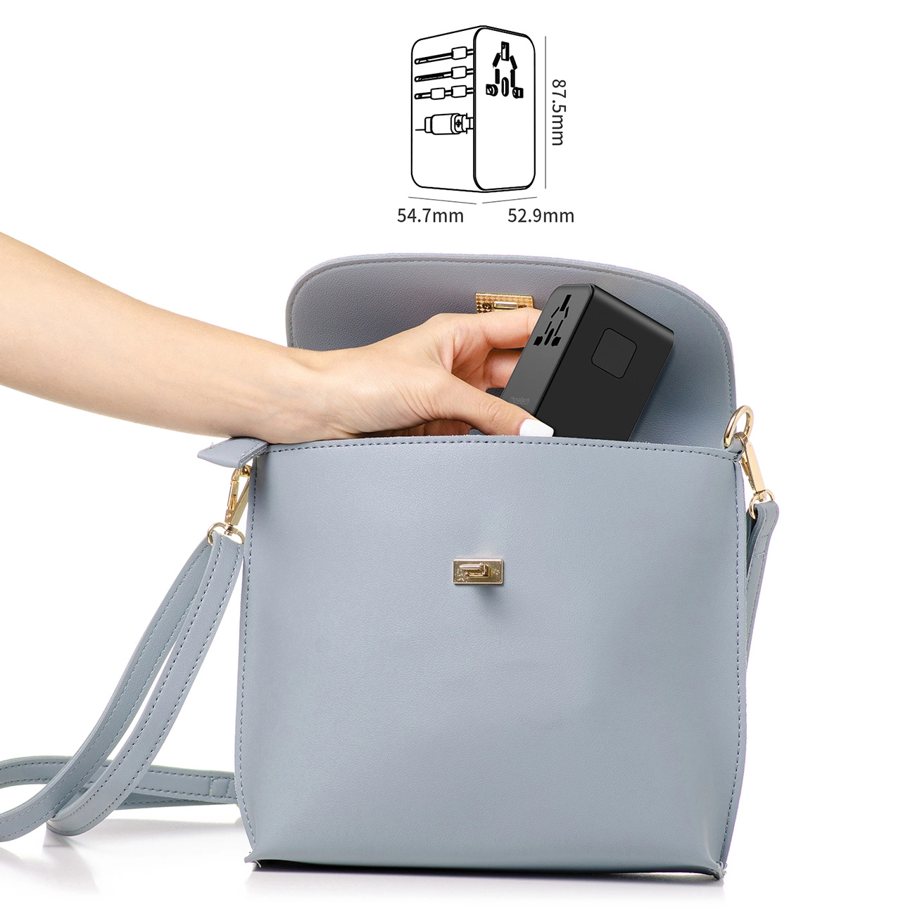 A woman puts the Choetech PD5022 Travel Adapter into her purse