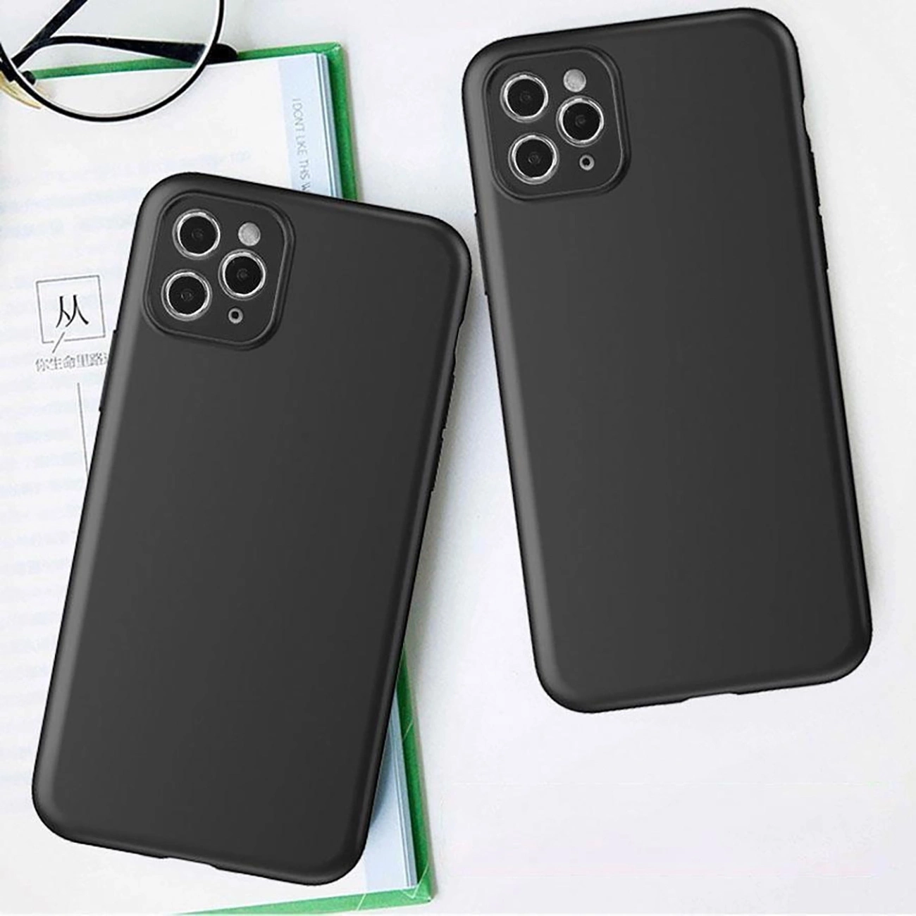 Two phones lying on the table in Soft Cases